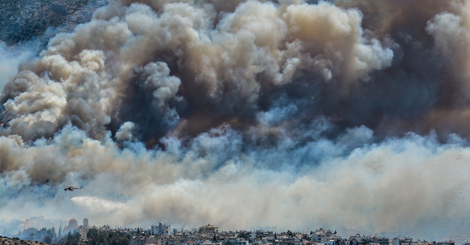 photos-capture-fiery-wildfires-threatening-greek-homes-huffpost