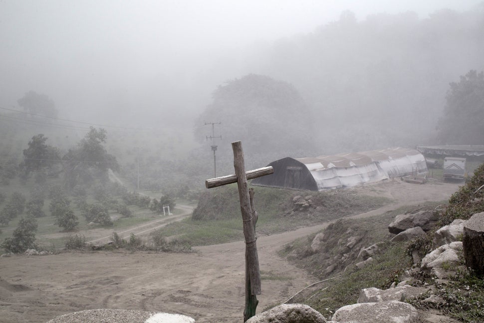 View of La Mesa community, Colima State, Mexico, on July 12, 2015, during the eruption of the Fire volcano. Hundreds of people were evacuated from villages around Mexico's 'Volcano of Fire' and an airport closed on Saturday amid fears an eruption could escalate to become the biggest in a century. AFP PHOTO / HECTOR GUERRERO (Photo credit should read HECTOR GUERRERO/AFP/Getty Images)