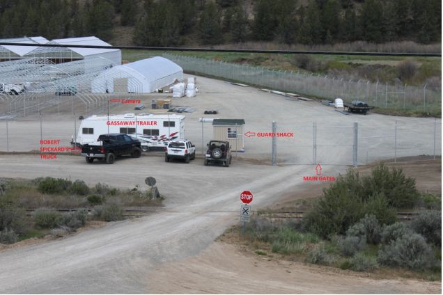 <p>A photo from the U.S. Attorney's Office's search warrant details the main gate and guard shack of the XL Ranch. </p>