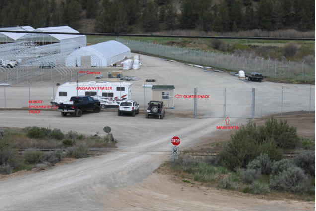 A photo from the U.S. Attorney's Office's search warrant details the main gate and guard shack of the XL Ranch. 