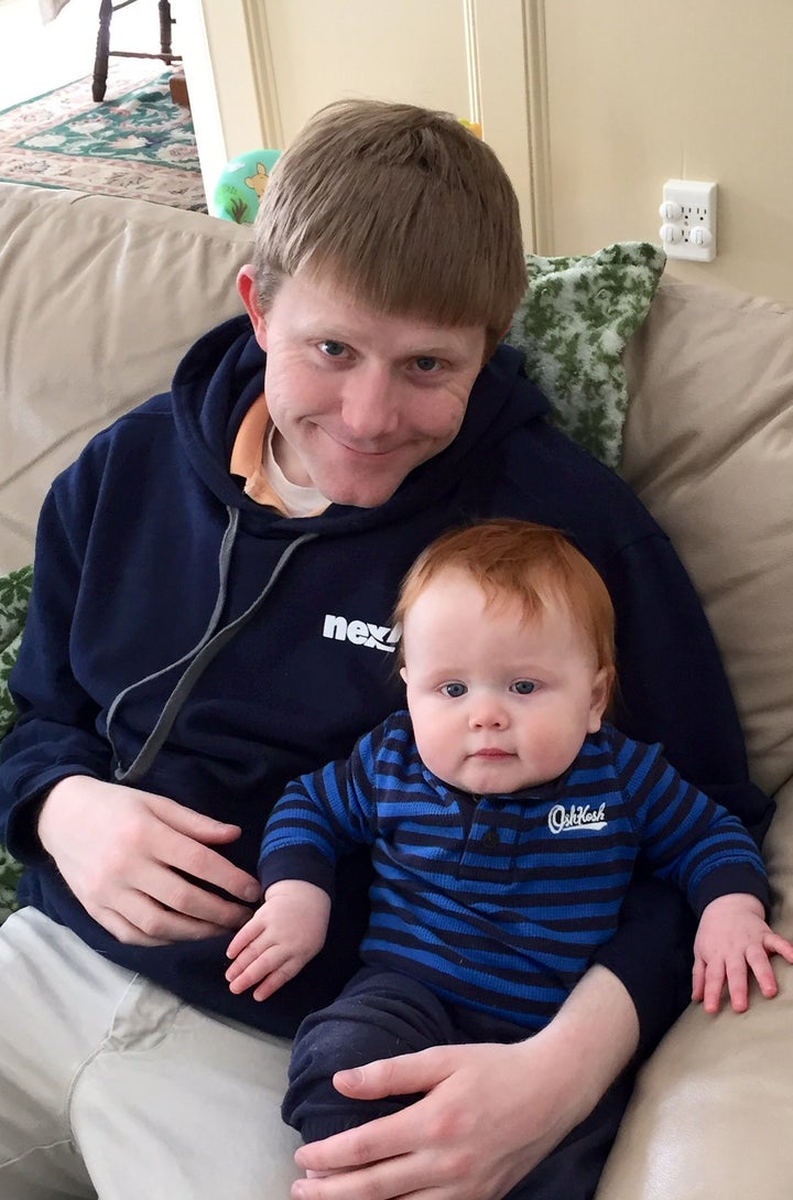 Troy Goode and his child in an undated photo.