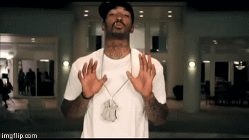 J.R. Smith flashes his Young Money chain in the "Bed Rock" video.