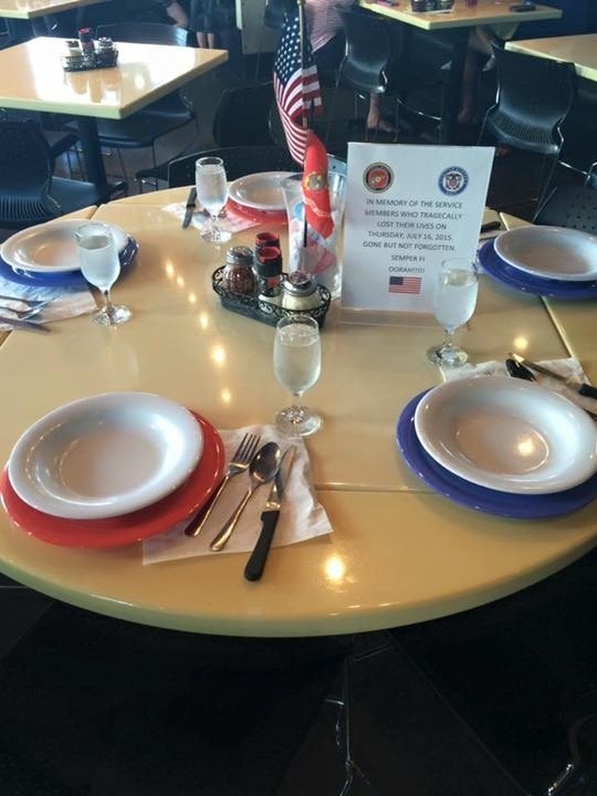 <span>The table that was set aside for the shooting victims at the Mellow Mushroom Hamilton Place location.</span>