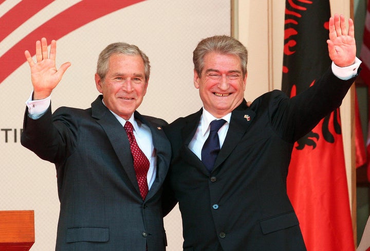 Former U.S. President George W. Bush with Albanian Prime Minister Sali Berisha on June 10, 2007, in the courtyard of the Council of Ministers in Tirana, Albania. 