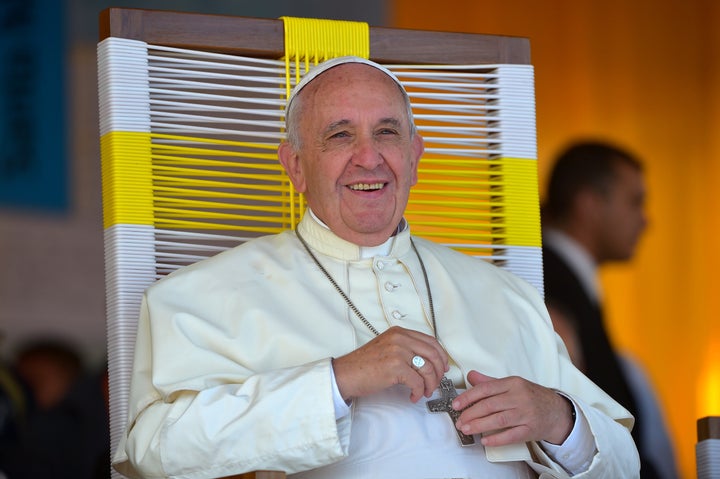 Pope Francis smiles during a visit to the people of Banado Norte at the Chapel of Juan Bautista in Asuncion on July 12, 2015.