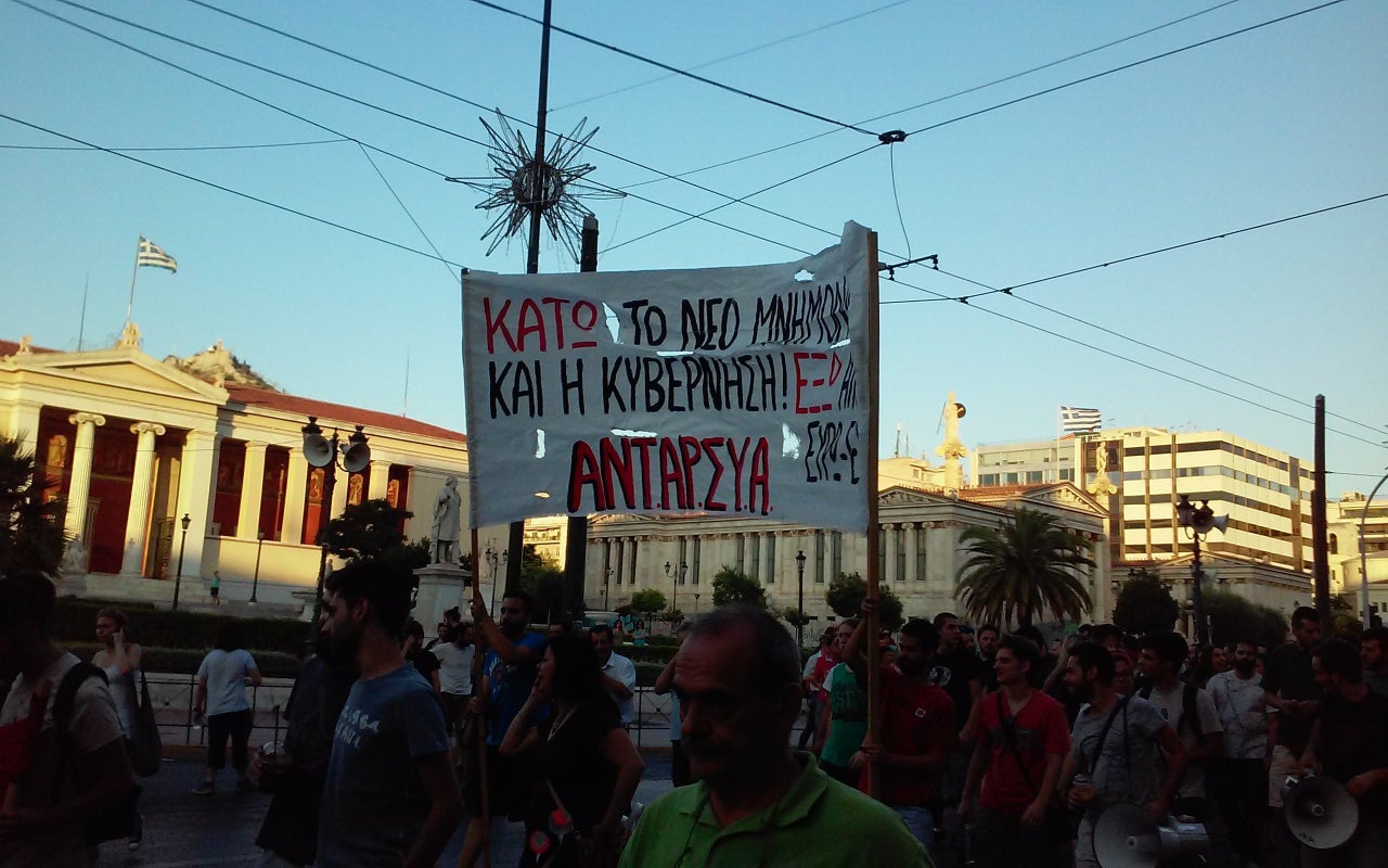 <p><span style="font-family: Arial, Helvetica, sans-serif; font-size: 14px; line-height: 20px; background-color: #eeeeee;">An ANTARSYA banner held by protesters in Athens on July 22, 2015.</span></p>