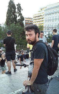 <p><span style="font-family: Arial, Helvetica, sans-serif; font-size: 14px; line-height: 20px; background-color: #eeeeee;">Giorgos, 32, protests "the attempted destruction of our lives" at a rally in Athens on July 22, 2015.</span></p>