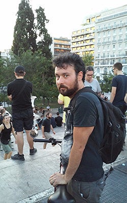 Giorgos, 32, protests "the attempted destruction of our lives" at a rally in Athens on July 22, 2015.