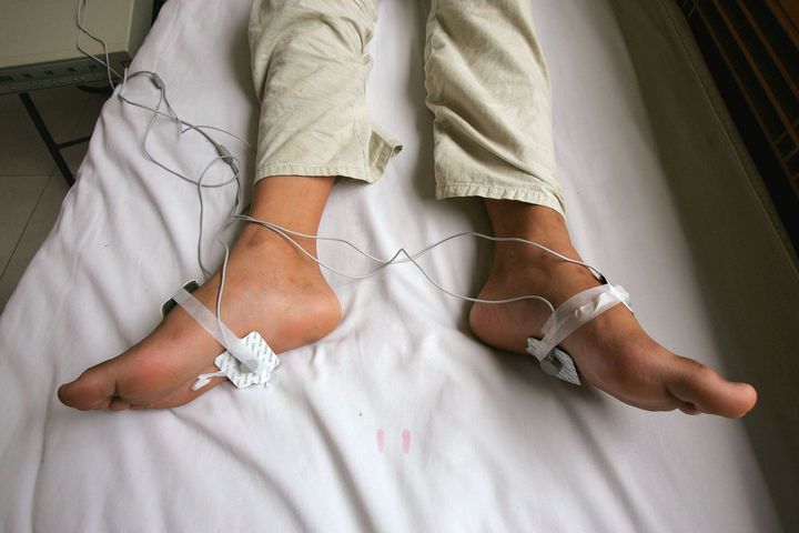 A 12-year-old boy receives&nbsp;electric shock treatment for his Internet addiction at the Beijing Military Region Central Ho