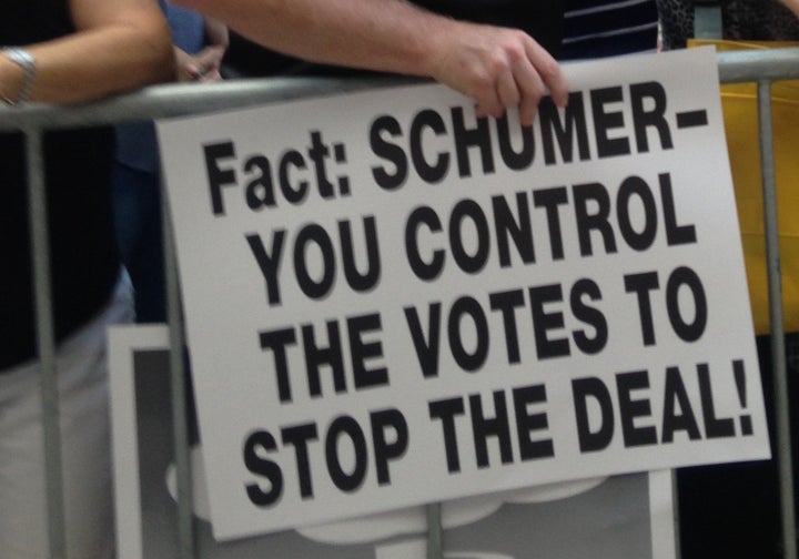 A protester holds a sign at the rally.