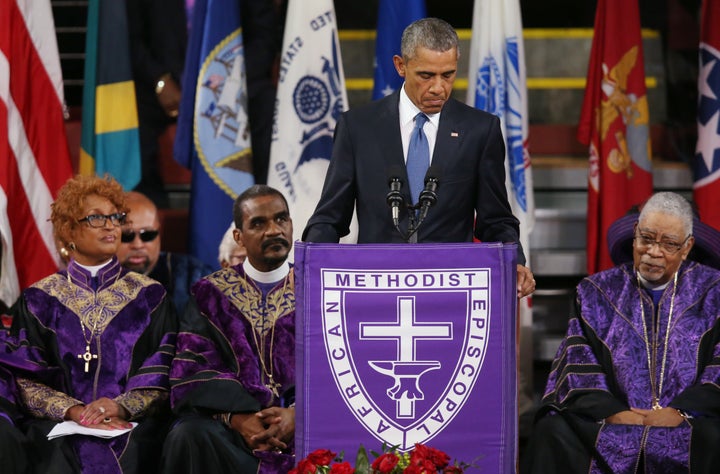 <p>President Barack Obama delivers the eulogy for South Carolina state senator and Rev. Clementa Pinckney, one of nine people killed at a shooting at a historic black church in Charleston, South Carolina, in June.</p>