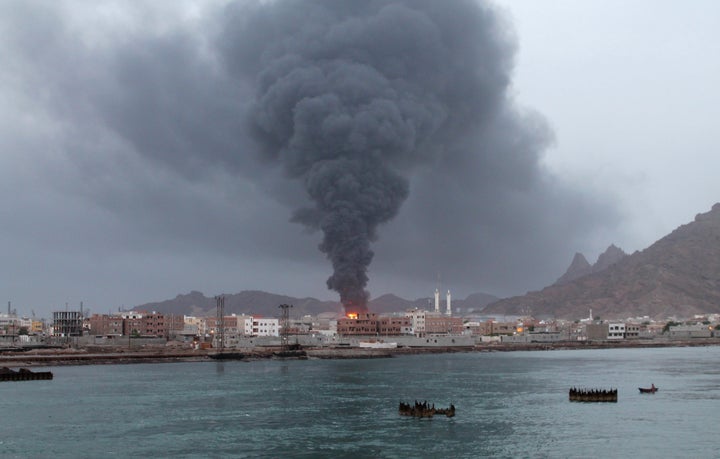 Fire and smoke rises from the Aden oil refinery following a reported shelling attack by Houthi rebels in the embattled southern Yemeni city of Aden on July 13, 2015.