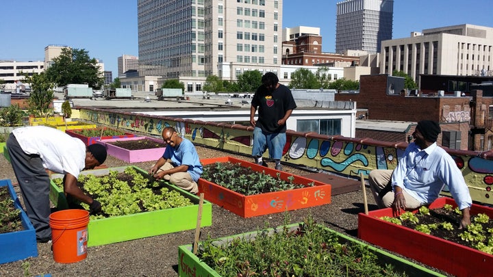 Residents of the Metro Atlanta Task Force plant on the shelter's rooftop garden.