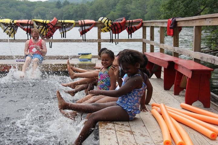 <p>Participants in Homes for the Homeless' summer camp program taking part in swimming lessons.</p>