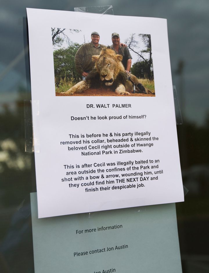 A sign posted on the door of Walter Palmer's dental practice on July 28, 2015.