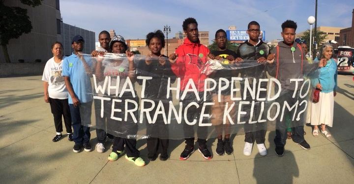 Protesters rally on July 10, 2015, in front of the Frank Murphy Hall of Justice in Detroit, calling for information in the investigation into the fatal shooting of Terrance Kellom.