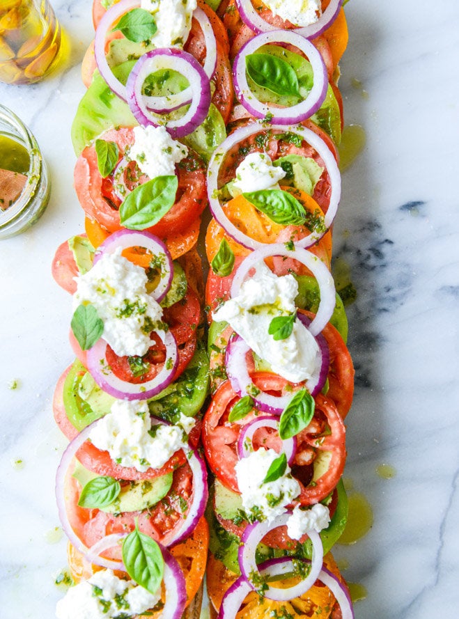 Heirloom Tomato, Avocado And Burrata Salad On Grilled Garlic Toast