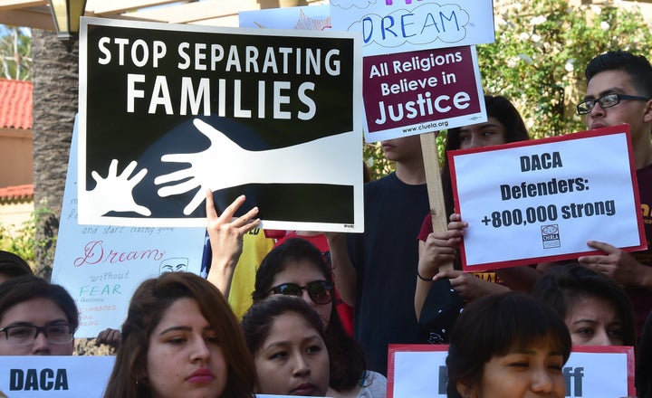 <p>Immigration reform activists demonstrate against deportations outside a federal court in Pasadena, California, on July 16, 2015.</p>