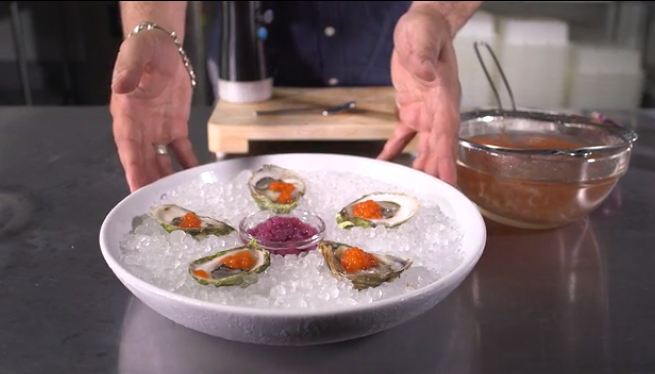 <p>Red onion and wine vinegar pearls at center; Tabasco sauce pearls on oysters.</p>