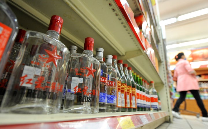 <span>Bottles of baijiu are displayed at a store in Beijing on October 18, 2011. Ask any Westerner what they think is the wor