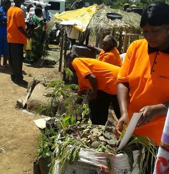 <p>GROOTS Kenya members demonstrate sack farming, a technique that has helped women in the region generate income and provide for their families at the same time, rather than solely practicing subsistence farming.</p>