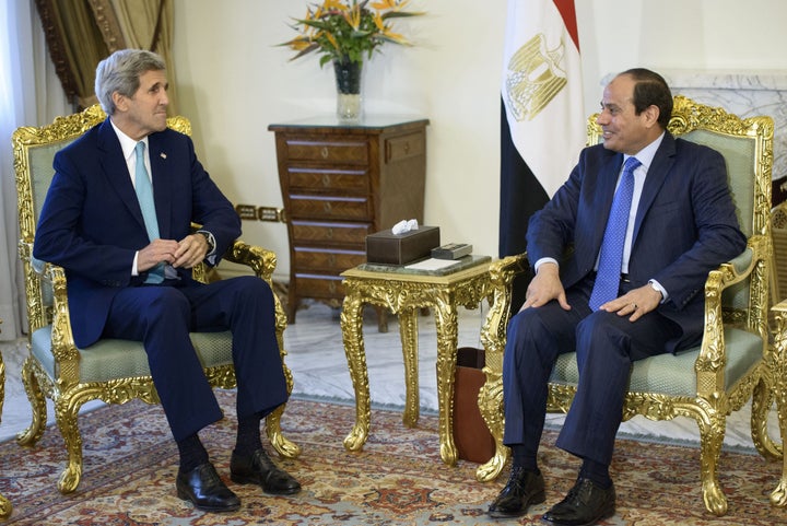 U.S. Secretary of State John Kerry (L) with controversial Egyptian President <span>Abdel-Fattah el-Sissi</span> in&