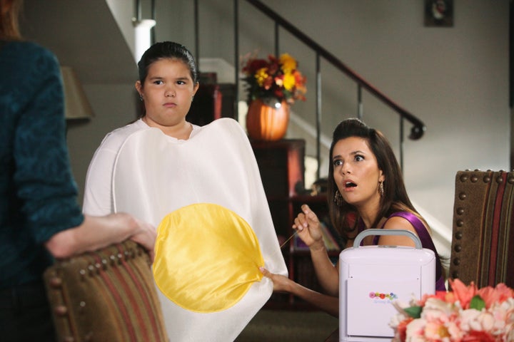 <p>Madison de la Garza and Eva Longoria on "Desperate Housewives."</p>