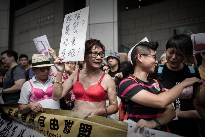 Men wear bras in Hong Kong to protest woman's 'breast assault