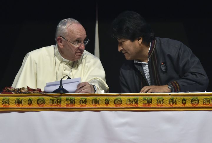 Pope Francis speaks with Bolivian President Evo Morales during the Second World Meeting of the Popular Movements at the Expo Feria Exhibition Centre, in Santa Cruz, Bolivia, on July 9, 2015.