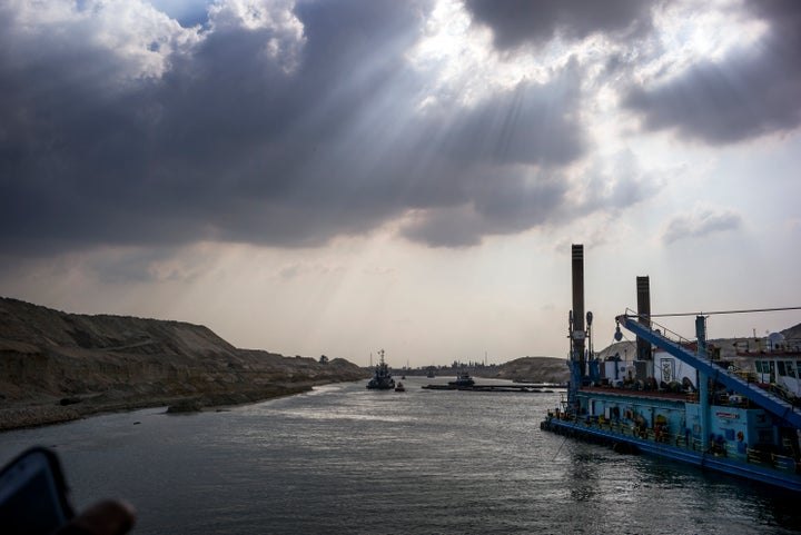 Construction takes place along the edge of the New Suez Canal in Ismailia, Egypt, on June 13, 2015.