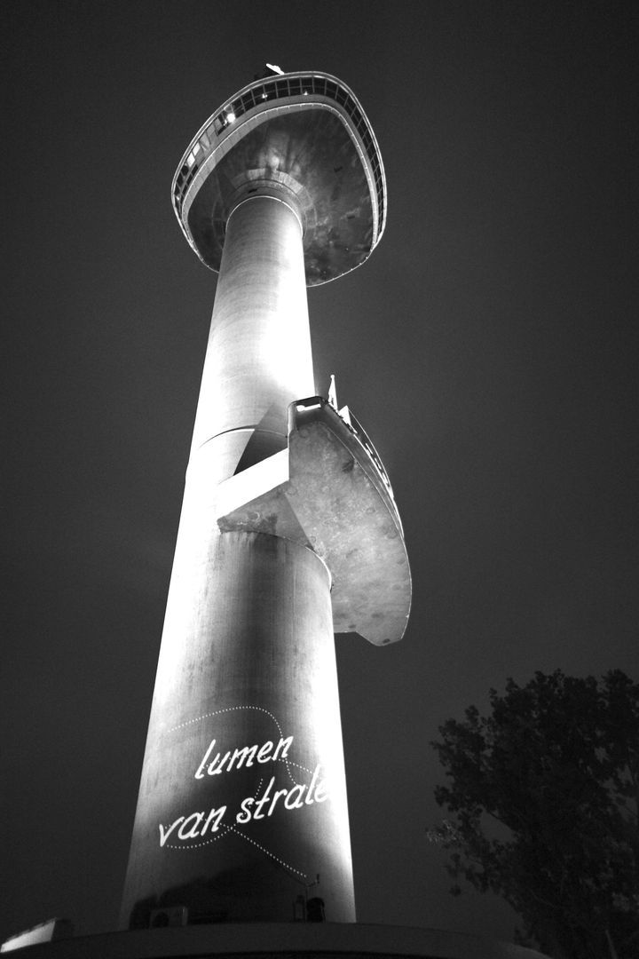 The artist beams her signature onto Rotterdam's tallest tower, the Euromast.
