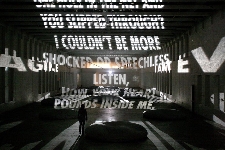 "Projection," a light poem by the artist Jenny Holzer.