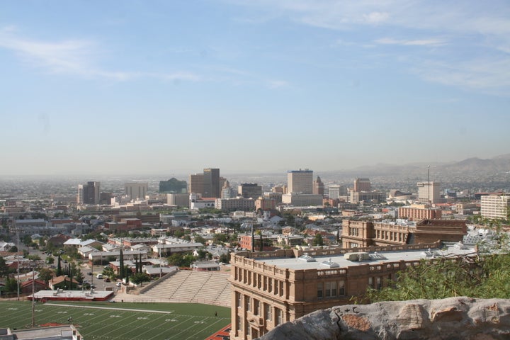 Standing high on Rim Road against the Rockies, El Paso and Juarez spread across the desert below. 