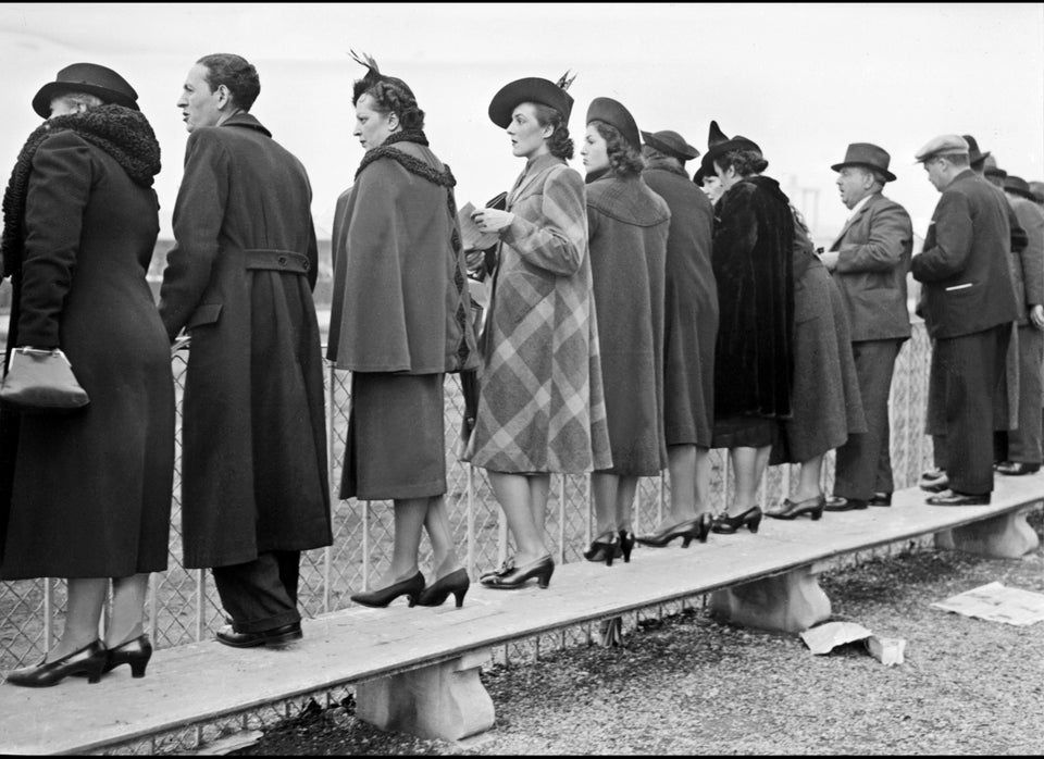 Stylish women (C) look to horses, 29 January 1939