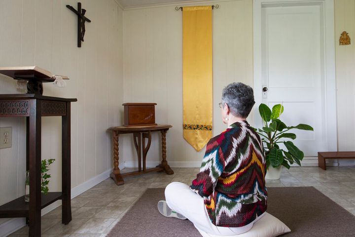 Sister Monica sits in her private prayer space. She has spent her career ministering to transgender people. 