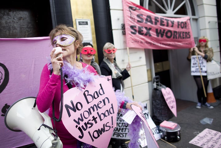 Sex workers and their supporters demonstrate in London's Soho district in October 2013 to protest the closure of premises used by sex workers and their eviction.