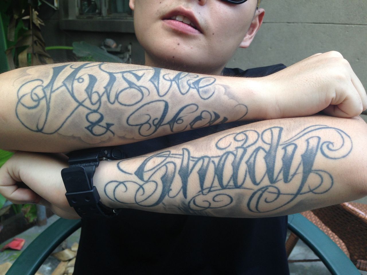 <p>English-language tattoos on Fat Shady's arms read "Hustle & Flow" and "Shady."</p>
