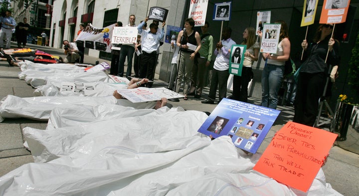 Protestors demonstrate outside of Washington's Union Station against the killings of union organizers in Colombia.