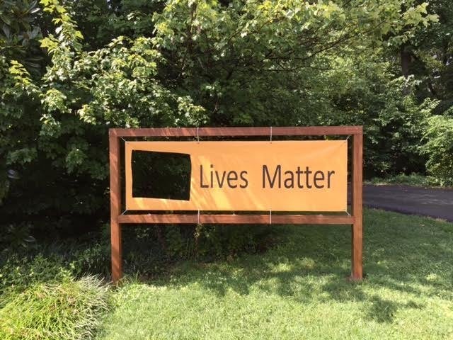 The River Road Unitarian Universalist Congregation's "Black Lives Matter" sign was defaced twice. 