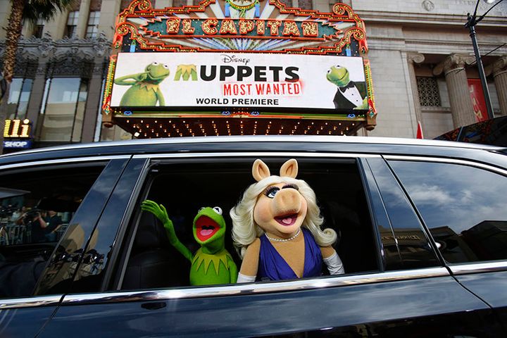 Kermit and Miss Piggy arrive at the premiere of “Muppets Most Wanted” at El Capitan Theatre in Hollywood on March 11, 2014. 