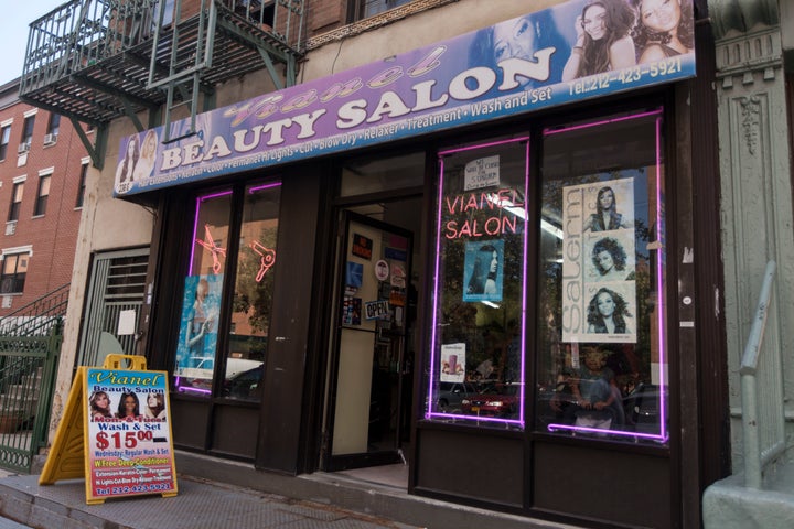 Vianel Garcia's beauty salon sits directly across the entrance to Our Lady Queen of Angels School.