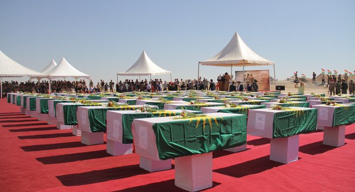 The funeral ceremony of 67 Yazidis, who were killed by ISIS militants and buried in mass graves, in Nineveh, Iraq, on Aug. 13, 2015.