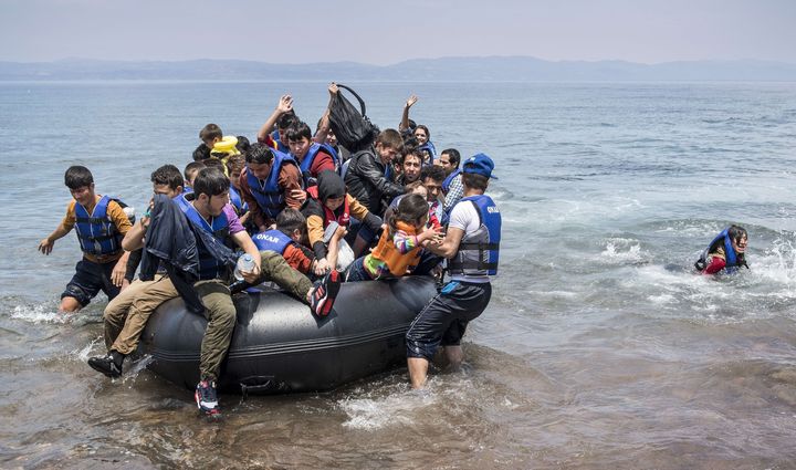 Refugees arrive on the shores of the Greek island of Lesbos on June 2, 2015.