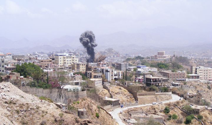 <p>Smoke rises after Saudi-led coalition airstrikes hit Taiz, Yemen, on April 17, 2015.</p>
