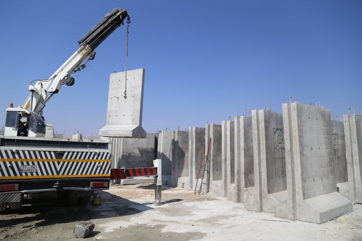 A wall is built along the Turkish-Syrian border, as taken in Hatay, Turkey, on Aug. 13, 2015.