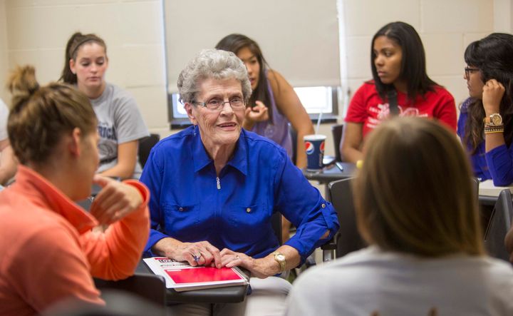 Jean Kops sits surrounded by younger students in a sociology class in September 2013.