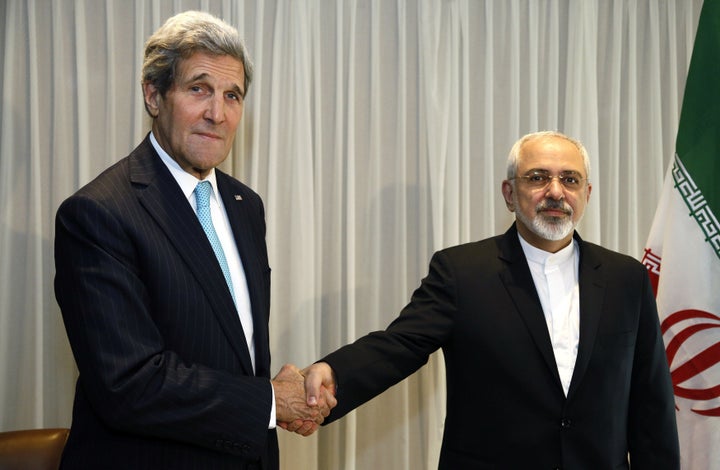 Iranian Foreign Minister Mohammad Javad Zarif shakes hands with Secretary of State John Kerry in Geneva on Jan. 14, 2015.