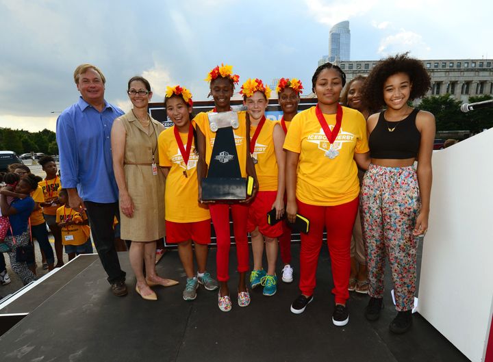 Amandla Stenberg (far right) on stage with ComEd CEO Anne Pramaggiore, COO Terence Donnelly, and the winning team -- Flaming Zing -- at the Field Museum in Chicago. Each participant in the derby received $1,000 in scholarship money and the winning team received a MacBook Air and all-expenses-paid admission to a weeklong technology camp. 