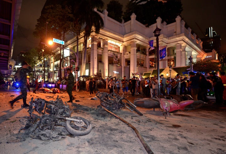 Thai soldiers inspect the scene after a bomb exploded outside a religious shrine in central Bangkok late on August 17, 2015.