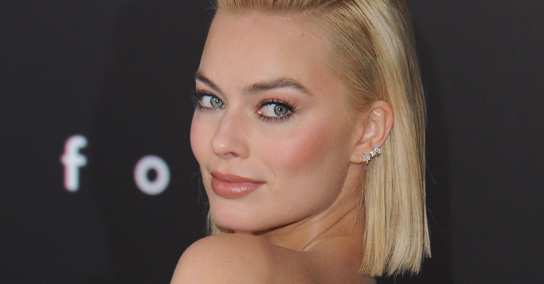 Margot Robbie's Harley Quinn Plays Tattoo Artist In New 'Suicide Squad